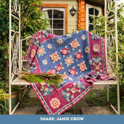 Red house colourway of the Fruit Garden Blanket by Janie Crow