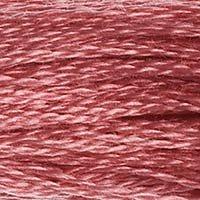 Close up of DMC stranded cotton shade 335 Dark Rose