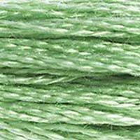 Close up of DMC stranded cotton shade 368 Nile Green