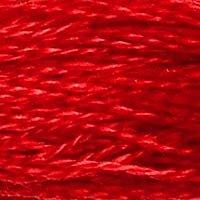 Close up of DMC stranded cotton shade 666 Bright Red