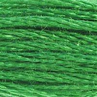 Close up of DMC stranded cotton shade 701 Lawn Green