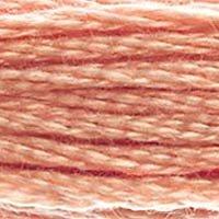 Close up of DMC stranded cotton shade 758 Dawn Rose