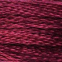 Close up of DMC stranded cotton shade 815 Cherry Red