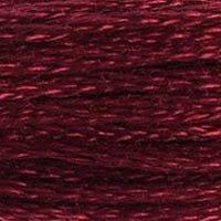 Close up of DMC stranded cotton shade 816 Red Fruit