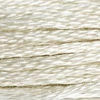 Close up of DMC stranded cotton shade 822 Cotton Cream