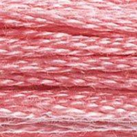 Close up of DMC stranded cotton shade 899 Medium Rose