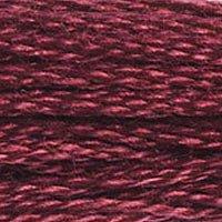 Close up of DMC stranded cotton shade 902 Garnet Red