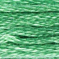 Close up of DMC stranded cotton shade 913 Jade Green