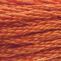 Close up of DMC stranded cotton shade 921 Burnt Ochre Orange