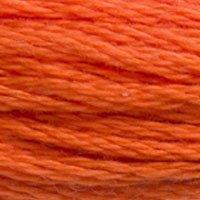 Close up of DMC stranded cotton shade 946 Fire Orange