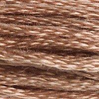 Close up of DMC stranded cotton shade 3064 Cinnamon Brown