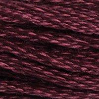 Close up of DMC stranded cotton shade 3685 Dark Mauve