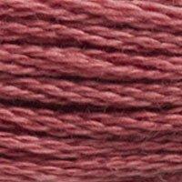 Close up of DMC stranded cotton shade 3722 Rosebush Pink