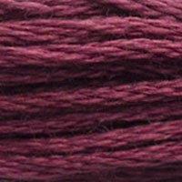 Close up of DMC stranded cotton shade 3802 Aubergine Mauve