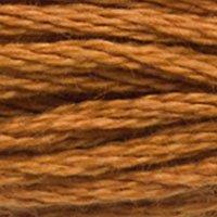 Close up of DMC stranded cotton shade 3826 Golden Brown
