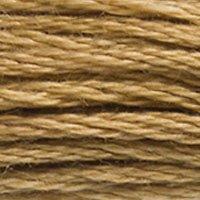 Close up of DMC stranded cotton shade 3828 Oaktree Brown