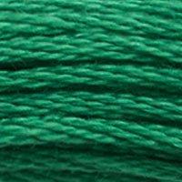 Close up of DMC stranded cotton shade 3850 Emerald Green