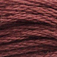 Close up of DMC stranded cotton shade 3858 Medium Red Wine