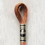 Close up of DMC stranded cotton shade 301 Copper