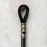 Close up of DMC stranded cotton shade 310 Black